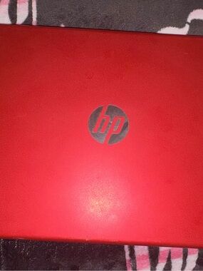 HP Red Laptop with Silver HP Logo
